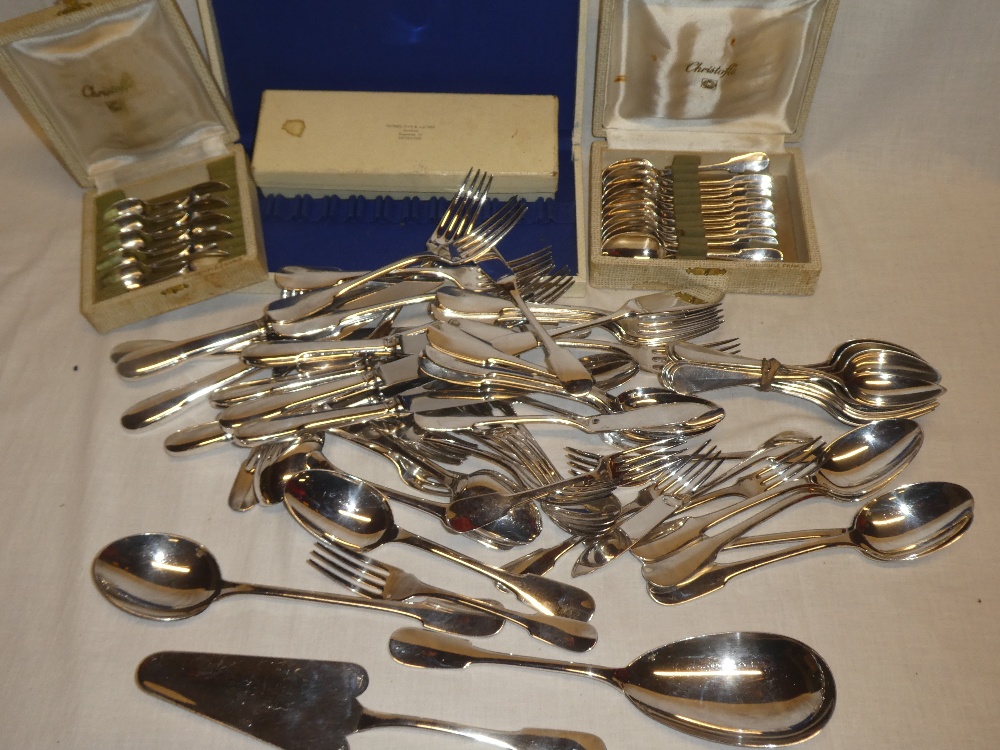 A large selection of French silver-plated table cutlery by Christophle together with two part sets