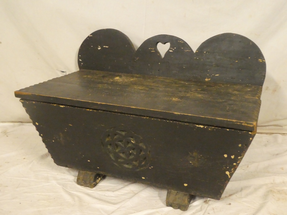 A 19th century Continental stained pine rectangular box-seat trunk with tapered sides,