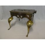 An early 19th Century brass rectangular two handled footman on cabriole-style legs,