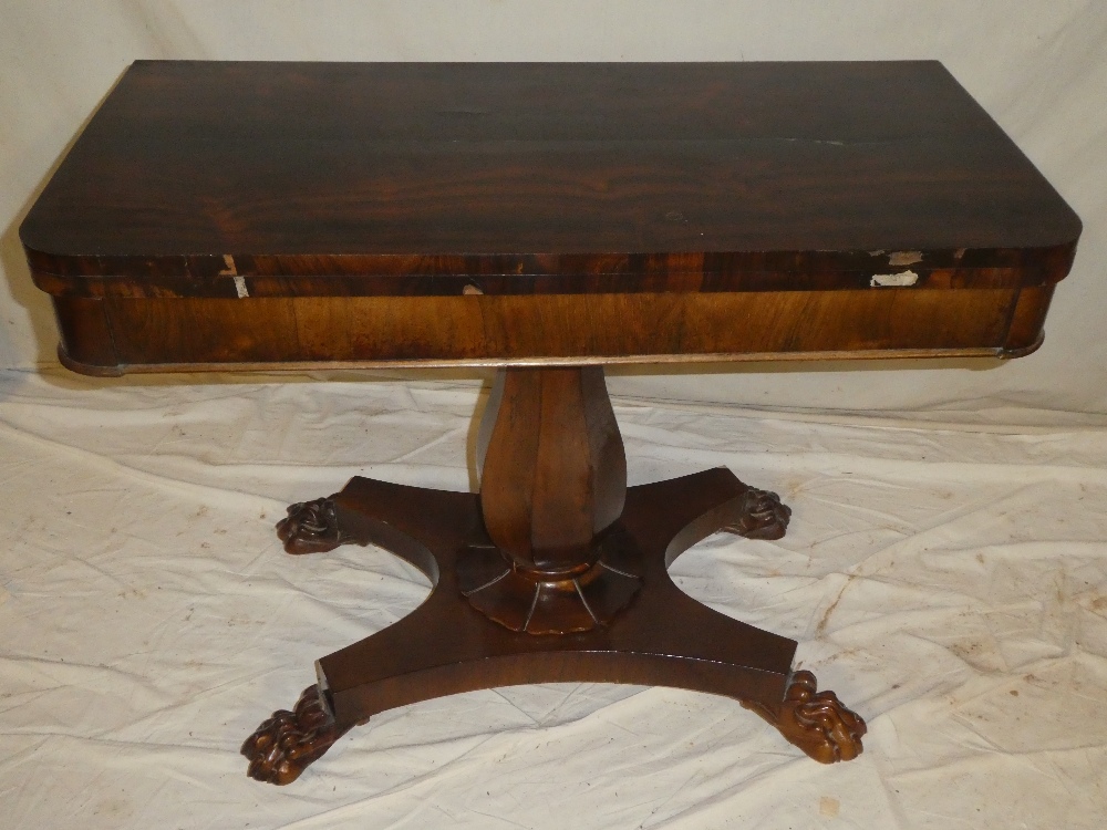 A Victorian rosewood rectangular turnover-top card table with baize lined playing surface on