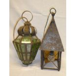 A brass octagonal ceiling light with green tinted glass panels and one other painted metal hall