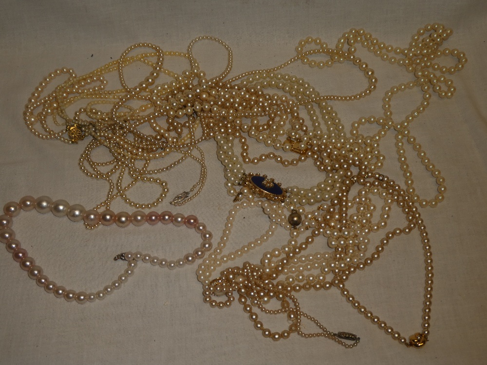 A selection of various costume jewellery, mainly pearl-effect necklaces etc.