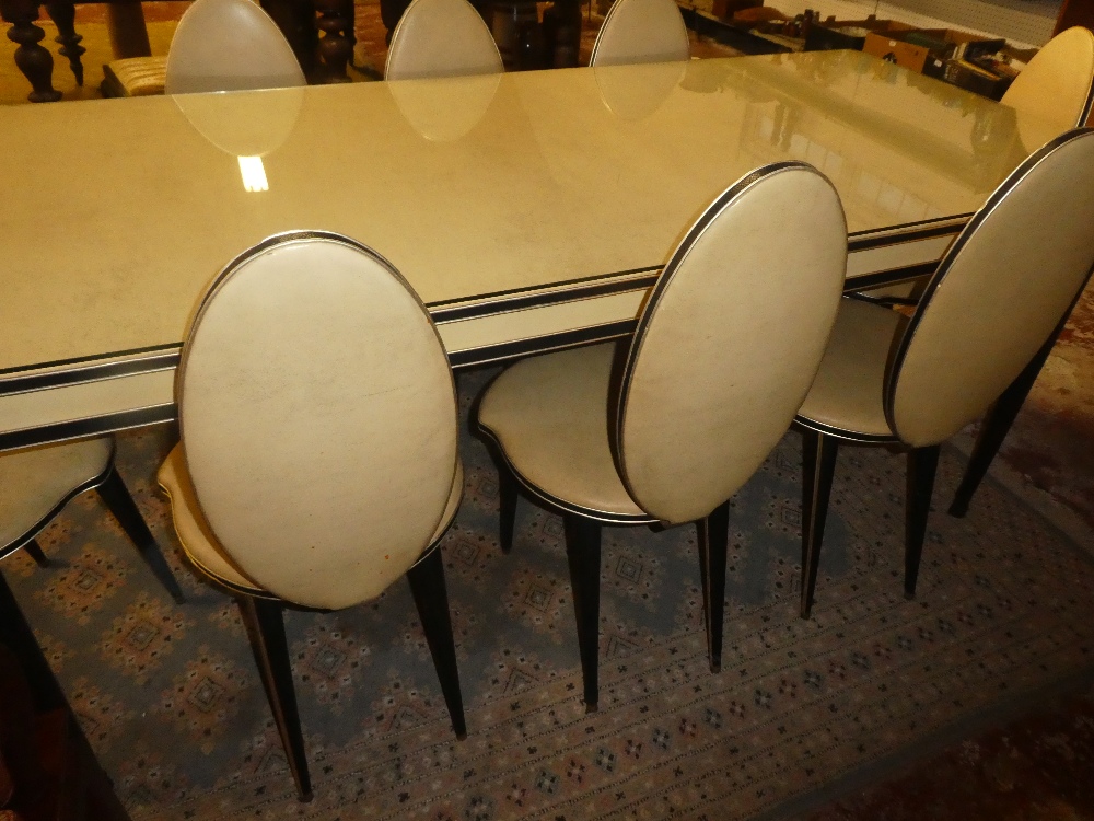 An unusual 1950's cream and black vinyl finished dining suite by Umberto Mascagni comprising a - Image 2 of 4