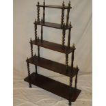 A 19th Century rosewood five tier whatnot with spiral twist supports