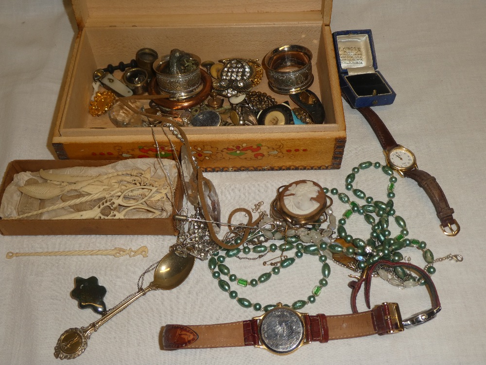 A jewellery box containing a quantity of various costume jewellery, watches,