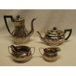 A Victorian silver four-piece tea and coffee set by Mappin & Webb comprising oval tapered coffee