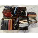 Five boxes containing a large selection of empty stamp albums and folders,