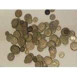 A selection of over 30 pre-1947 silver florins, a selection of approximately 30 silver sixpences,