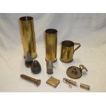 A selection of various trench art items including 1918 souvenir of the Great War shell case,