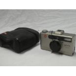 A Leica Minilux zoom 35mm camera and transit case