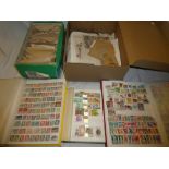 Two boxes containing a large selection of World stamps in stock books, albums, packets etc.
