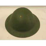 A First Ward brodie steel helmet with traces of original graining,