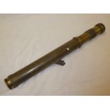 An old brass gun sighting telescope by Ottway & Co.