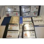 Five cover albums containing a selection of first day covers, USA covers, Australia covers,