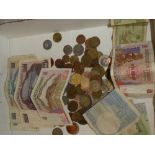 A selection of mixed Foreign coinage and banknotes