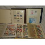 Four albums/stock books containing a collection of Germany stamps together with first day covers,