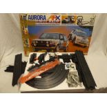 An AFX Aurora Daredevil rally racing car set,