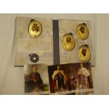 A commemorative 1936 "Year Of The Three Kings" four-piece gilt oval medallion set illustrating