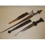 An African dagger with double-edged blade and leather mounted hilt in leather scabbard and one