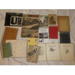 Various volumes including New Guinea Victory, Porthleven Through All The Changing Scenes,