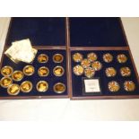 Twelve gilt medallions commemorating the 75th Anniversary of World War Two in fitted case and 12