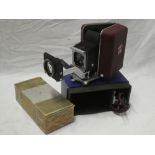 An old small Zett 150 folding projector with Voigtlander lens in original case