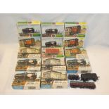 A large selection of 00 gauge railway layout accessories including signals, buildings,