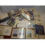 A selection of over seventy various GB mint stamp presentation packs together with various albums