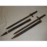 Two Portuguese model 1893 Artillery bayonets with steel mounted leather scabbards