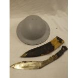 A Second War grey painted steel military helmet and a Gurkha kukri(2)