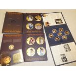 Two cased volumes of commemorative coins "Diana Portraits of a Princess" including eight enamelled