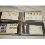 Two cover albums containing a selection of over 100 various GB first day covers including 1966
