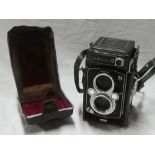 A Yashica 12 twin lens reflex camera in leather case