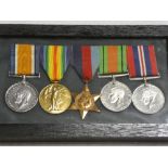 A group of five medals awarded to Lieut. R. N. E.