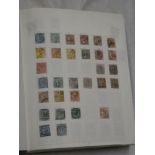 A folder album of World stamps I-S including St.