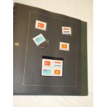 A folder album containing a collection of United Nations mint flag stamps,