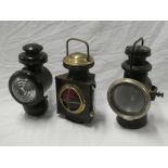 Three various old motoring lamps including Gamage of London brass mounted rear lamp,