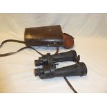 A pair of 7x military binoculars by Barr & Stroud in leather case