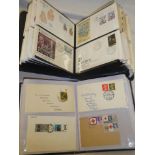 Two albums containing a large selection of GB and Foreign first day covers, US first flight covers,