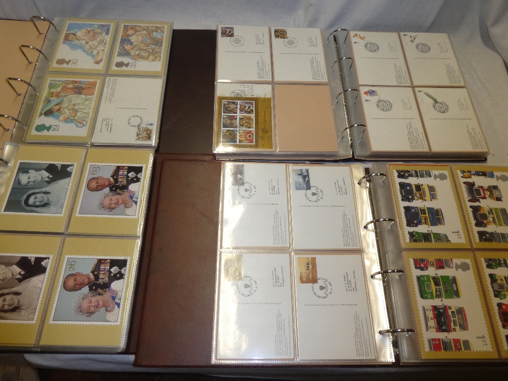 Four large albums containing a large collection of GB PHQ cards 1992-2005