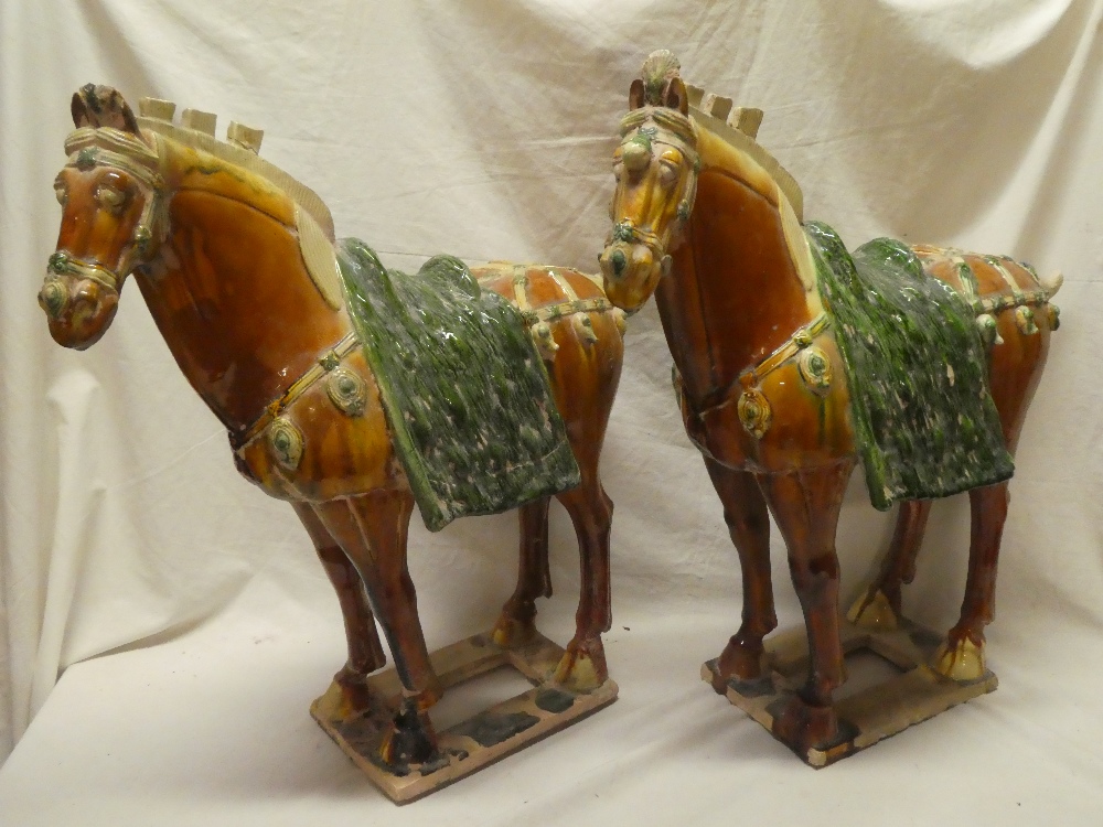 A pair of Eastern majolica-glazed Tang-style horses 21½" high