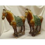 A pair of Eastern majolica-glazed Tang-style horses 21½" high