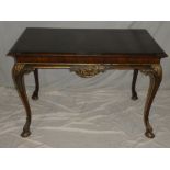 A good quality French figured walnut rectangular centre table with gilt painted scroll supports on