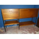 A pair of small 1960's Ladderex teak bureau units above shelves on metal supports 37½" high x 59"