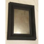 A 19th century rectangular wall mirror in painted wood frame 22" x 16"