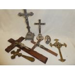A selection of various crucifixes including nickel and mother-of-pearl wall font,