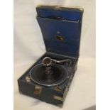 An HMV portable gramophone with chromium plated mounts retailed by Russell of Oxford in blue fibre