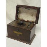 A Gecophone crystal radio set in mahogany rectangular case with instructions