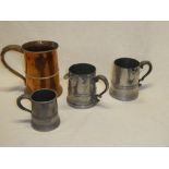 Two 19th century pewter pint tankards with side pouring lips,