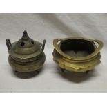 A small Eastern bronze circular two-handled censer,